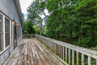 This 2-bedroom, 3-bath home, second row from the sound, offers a on The Country Club of the Crystal Coast in North Carolina - for sale on GolfHomes.com, golf home, golf lot