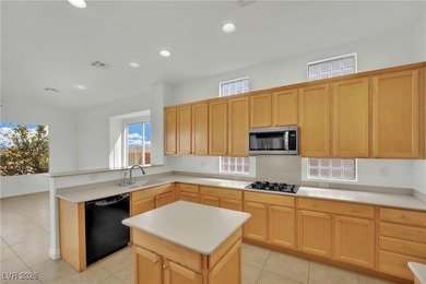 Single-story home in Sun City MacDonald Ranch, a 55+ Henderson on Desert Willow Golf Course in Nevada - for sale on GolfHomes.com, golf home, golf lot