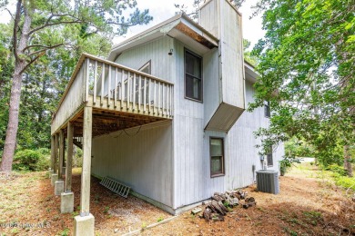 This 2-bedroom, 3-bath home, second row from the sound, offers a on The Country Club of the Crystal Coast in North Carolina - for sale on GolfHomes.com, golf home, golf lot