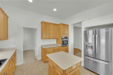 Single-story home in Sun City MacDonald Ranch, a 55+ Henderson on Desert Willow Golf Course in Nevada - for sale on GolfHomes.com, golf home, golf lot