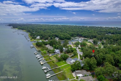 This 2-bedroom, 3-bath home, second row from the sound, offers a on The Country Club of the Crystal Coast in North Carolina - for sale on GolfHomes.com, golf home, golf lot