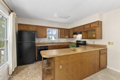 This 2-bedroom, 3-bath home, second row from the sound, offers a on The Country Club of the Crystal Coast in North Carolina - for sale on GolfHomes.com, golf home, golf lot