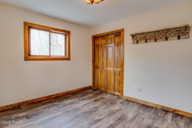 Bring your golf clubs to this  beautiful 4 bedroom 2 bathroom on Paupack Hills Golf and Country Club in Pennsylvania - for sale on GolfHomes.com, golf home, golf lot