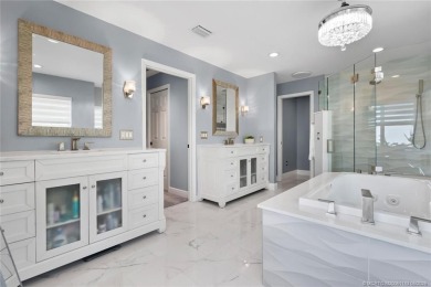 This 3BD, 2.5BA CBS pool home in Palm City is anything but on Evergreen Club in Florida - for sale on GolfHomes.com, golf home, golf lot