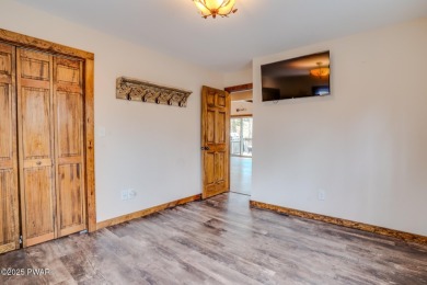 Bring your golf clubs to this  beautiful 4 bedroom 2 bathroom on Paupack Hills Golf and Country Club in Pennsylvania - for sale on GolfHomes.com, golf home, golf lot