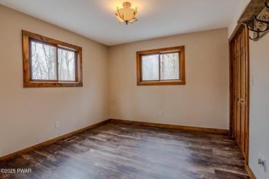 Bring your golf clubs to this  beautiful 4 bedroom 2 bathroom on Paupack Hills Golf and Country Club in Pennsylvania - for sale on GolfHomes.com, golf home, golf lot