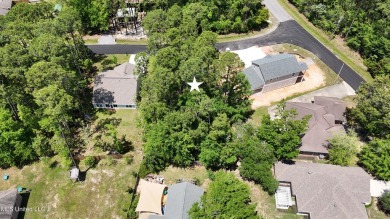 Diamondhead MS, has a variety of amenities right at your on Diamondhead Country Club in Mississippi - for sale on GolfHomes.com, golf home, golf lot
