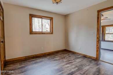 Bring your golf clubs to this  beautiful 4 bedroom 2 bathroom on Paupack Hills Golf and Country Club in Pennsylvania - for sale on GolfHomes.com, golf home, golf lot