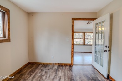 Bring your golf clubs to this  beautiful 4 bedroom 2 bathroom on Paupack Hills Golf and Country Club in Pennsylvania - for sale on GolfHomes.com, golf home, golf lot