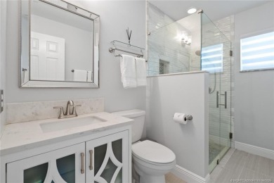 This 3BD, 2.5BA CBS pool home in Palm City is anything but on Evergreen Club in Florida - for sale on GolfHomes.com, golf home, golf lot