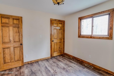 Bring your golf clubs to this  beautiful 4 bedroom 2 bathroom on Paupack Hills Golf and Country Club in Pennsylvania - for sale on GolfHomes.com, golf home, golf lot
