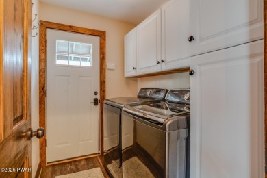 Bring your golf clubs to this  beautiful 4 bedroom 2 bathroom on Paupack Hills Golf and Country Club in Pennsylvania - for sale on GolfHomes.com, golf home, golf lot