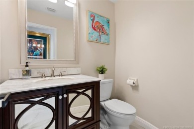 This 3BD, 2.5BA CBS pool home in Palm City is anything but on Evergreen Club in Florida - for sale on GolfHomes.com, golf home, golf lot
