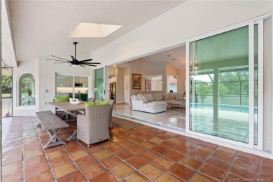 This 3BD, 2.5BA CBS pool home in Palm City is anything but on Evergreen Club in Florida - for sale on GolfHomes.com, golf home, golf lot