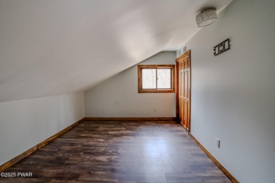 Bring your golf clubs to this  beautiful 4 bedroom 2 bathroom on Paupack Hills Golf and Country Club in Pennsylvania - for sale on GolfHomes.com, golf home, golf lot