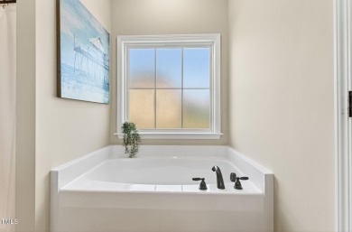 CUSTOM-BUILT HOME with over 3,000 SQ FT plus a LARGE UNFINISHED on Walnut Creek Country Club in North Carolina - for sale on GolfHomes.com, golf home, golf lot