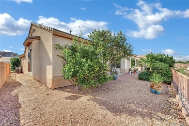 Single-story home in Sun City MacDonald Ranch, a 55+ Henderson on Desert Willow Golf Course in Nevada - for sale on GolfHomes.com, golf home, golf lot