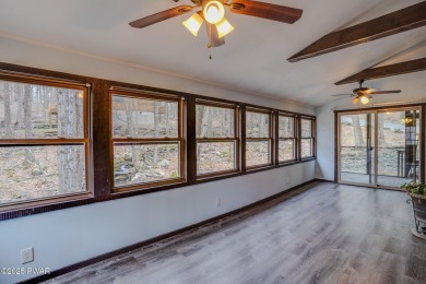 Bring your golf clubs to this  beautiful 4 bedroom 2 bathroom on Paupack Hills Golf and Country Club in Pennsylvania - for sale on GolfHomes.com, golf home, golf lot
