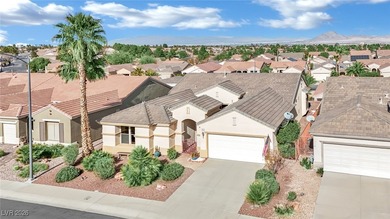 Single-story home in Sun City MacDonald Ranch, a 55+ Henderson on Desert Willow Golf Course in Nevada - for sale on GolfHomes.com, golf home, golf lot