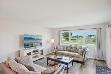 Paradise awaits you with this updated second floor unit on Seven Lakes Golf and Tennis Community in Florida - for sale on GolfHomes.com, golf home, golf lot