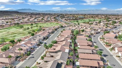 Single-story home in Sun City MacDonald Ranch, a 55+ Henderson on Desert Willow Golf Course in Nevada - for sale on GolfHomes.com, golf home, golf lot
