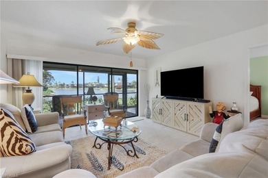 This desirable first floor condo has stunning lake views from on Riviera Golf Club in Florida - for sale on GolfHomes.com, golf home, golf lot