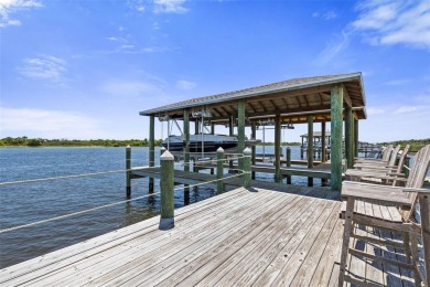 WATERFRONT RETREAT ON RIVERWALK! Welcome to your serene on Grand Haven Golf Club in Florida - for sale on GolfHomes.com, golf home, golf lot