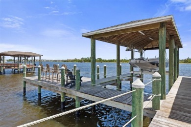 WATERFRONT RETREAT ON RIVERWALK! Welcome to your serene on Grand Haven Golf Club in Florida - for sale on GolfHomes.com, golf home, golf lot