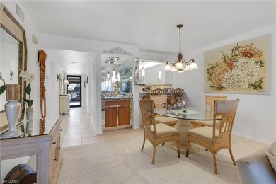 This desirable first floor condo has stunning lake views from on Riviera Golf Club in Florida - for sale on GolfHomes.com, golf home, golf lot