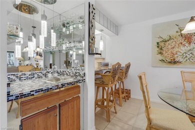 This desirable first floor condo has stunning lake views from on Riviera Golf Club in Florida - for sale on GolfHomes.com, golf home, golf lot