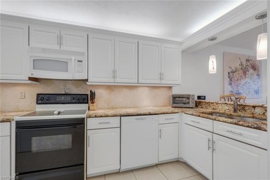 This desirable first floor condo has stunning lake views from on Riviera Golf Club in Florida - for sale on GolfHomes.com, golf home, golf lot