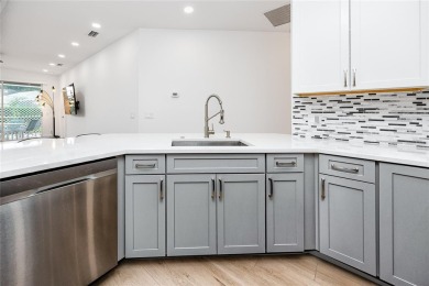 Welcome to Balintore, a charming and secluded single-family home on Lansbrook Golf Club in Florida - for sale on GolfHomes.com, golf home, golf lot