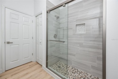 Welcome to Balintore, a charming and secluded single-family home on Lansbrook Golf Club in Florida - for sale on GolfHomes.com, golf home, golf lot