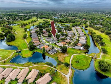 Welcome to Balintore, a charming and secluded single-family home on Lansbrook Golf Club in Florida - for sale on GolfHomes.com, golf home, golf lot
