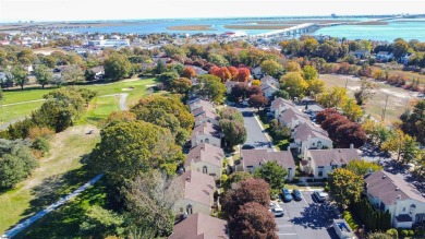 52 Greate Bay Court offers a serene retreat overlooking the on Greate Bay Golf Club in New Jersey - for sale on GolfHomes.com, golf home, golf lot