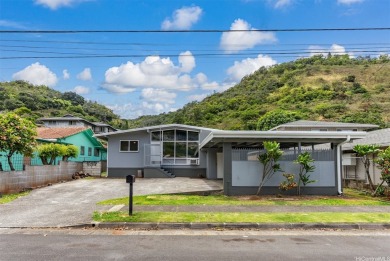 Nestled in a quiet and highly convenient location, this on Moanalua Golf Club in Hawaii - for sale on GolfHomes.com, golf home, golf lot