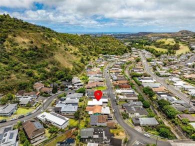 Nestled in a quiet and highly convenient location, this on Moanalua Golf Club in Hawaii - for sale on GolfHomes.com, golf home, golf lot