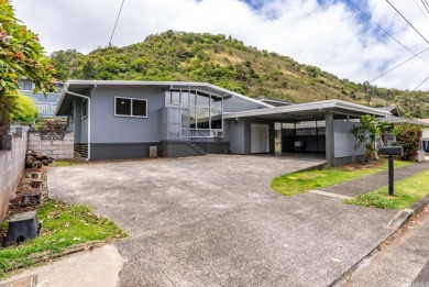 Nestled in a quiet and highly convenient location, this on Moanalua Golf Club in Hawaii - for sale on GolfHomes.com, golf home, golf lot