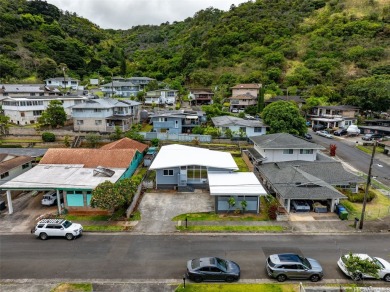 Nestled in a quiet and highly convenient location, this on Moanalua Golf Club in Hawaii - for sale on GolfHomes.com, golf home, golf lot