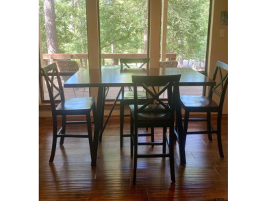 Situated on a hill, this one owner, two lot home allows for the on Holly Lake Ranch Golf Club in Texas - for sale on GolfHomes.com, golf home, golf lot