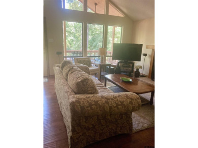 Situated on a hill, this one owner, two lot home allows for the on Holly Lake Ranch Golf Club in Texas - for sale on GolfHomes.com, golf home, golf lot