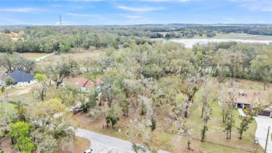 High and Dry, flood zone X!!! Tired of the busy city and hustle on Lake Jovita Golf and Country Club in Florida - for sale on GolfHomes.com, golf home, golf lot