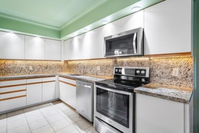 Move-in ready, top-floor residence in Eastgate with spectacular on Hunters Run Golf and Country Club in Florida - for sale on GolfHomes.com, golf home, golf lot