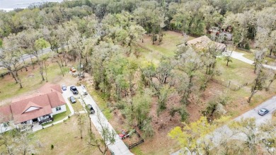 High and Dry, flood zone X!!! Tired of the busy city and hustle on Lake Jovita Golf and Country Club in Florida - for sale on GolfHomes.com, golf home, golf lot