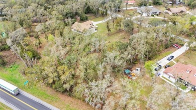 High and Dry, flood zone X!!! Tired of the busy city and hustle on Lake Jovita Golf and Country Club in Florida - for sale on GolfHomes.com, golf home, golf lot