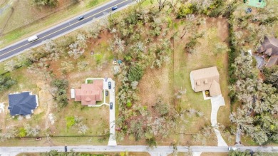 High and Dry, flood zone X!!! Tired of the busy city and hustle on Lake Jovita Golf and Country Club in Florida - for sale on GolfHomes.com, golf home, golf lot