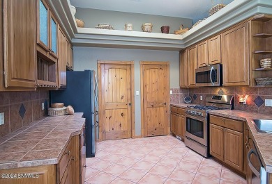 This 4-bedroom home is truly a Southwest delight with views on Sonoma Ranch Golf Course in New Mexico - for sale on GolfHomes.com, golf home, golf lot