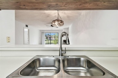 SELLERS WILL PAY THE BUYERS HOA FEE FOR THE FIRST 6 MONTHS on East Lake Woodlands Country Club in Florida - for sale on GolfHomes.com, golf home, golf lot