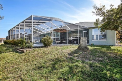 Welcome to this stunning 3-bedroom, 2-bathroom home located in on Twisted Oaks Golf Club in Florida - for sale on GolfHomes.com, golf home, golf lot