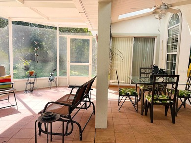 Charming three-bedroom, two-bathroom home featuring a two-car on Citrus Springs Country Club in Florida - for sale on GolfHomes.com, golf home, golf lot